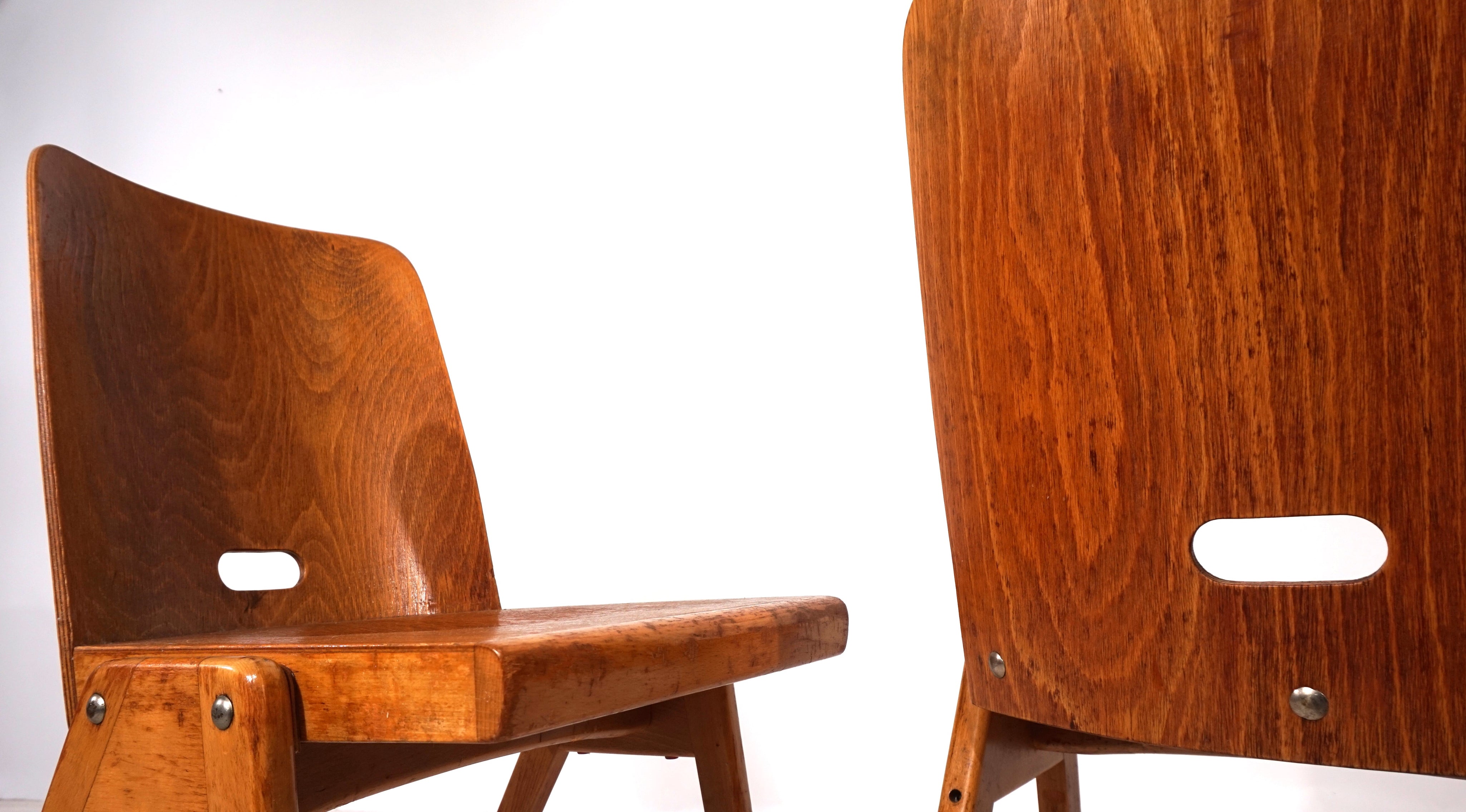 Set_of_2_stackable_plywood_dining_chairs_from_1960