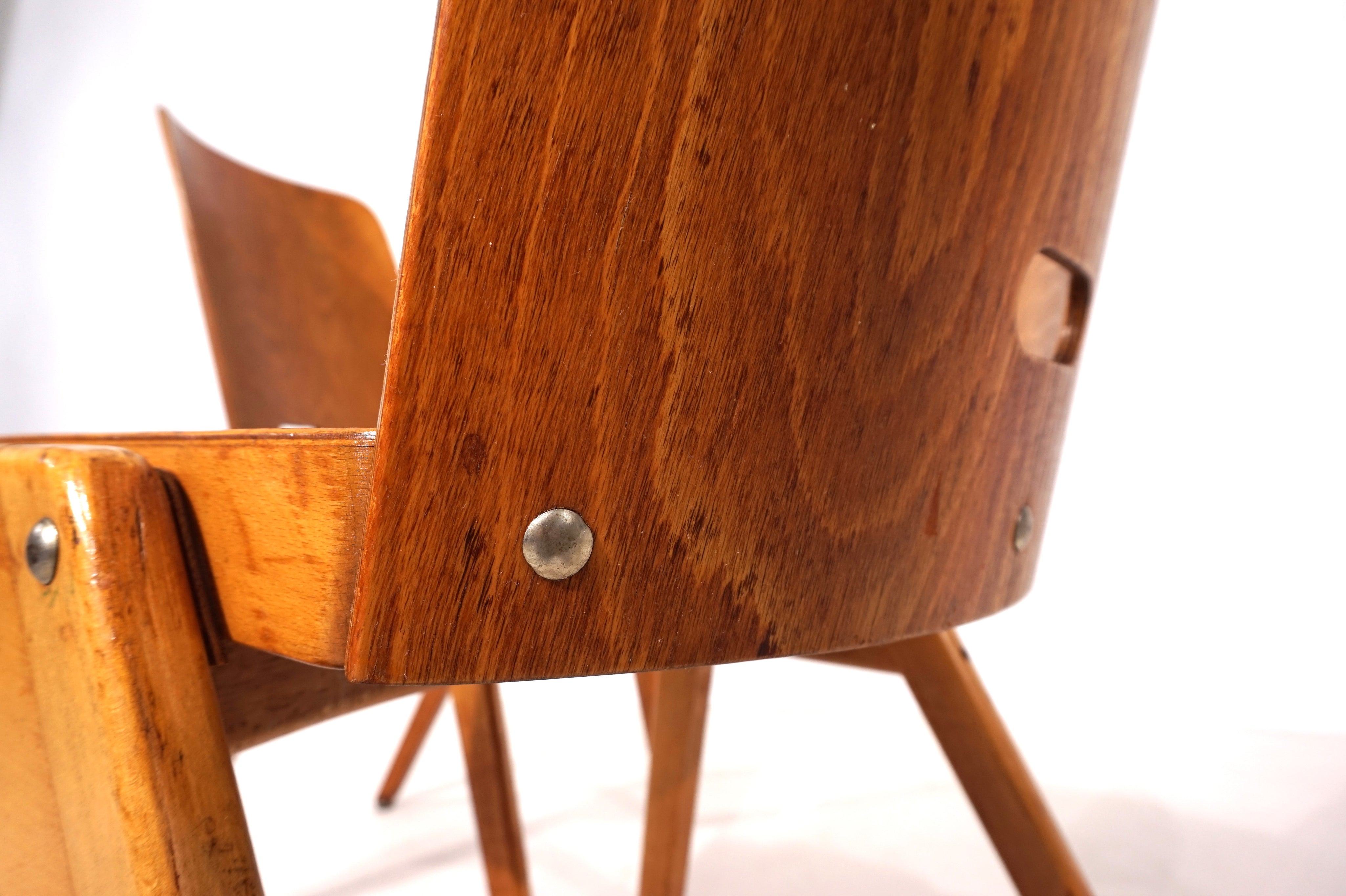 Set_of_2_stackable_plywood_dining_chairs_from_1960