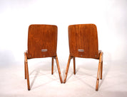 Set_of_2_stackable_plywood_dining_chairs_from_1960