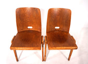 Set_of_2_stackable_plywood_dining_chairs_from_1960