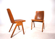 Set_of_2_stackable_plywood_dining_chairs_from_1960