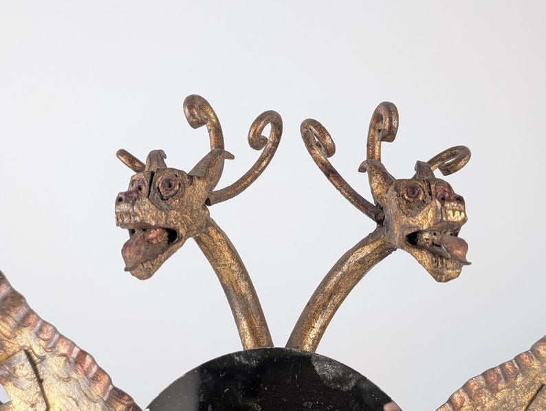 Spanish_Neo-Gothic_Style_Mirror_in_Gilded_Iron_with_Two-Headed_Dragon
