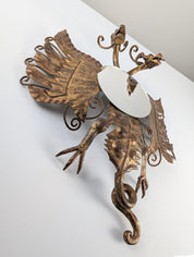 Spanish_Neo-Gothic_Style_Mirror_in_Gilded_Iron_with_Two-Headed_Dragon
