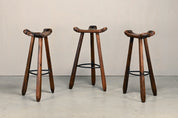 Set_of_Spanish_Brutalist_Folding_Home_Bar_with_3_Bar_Stools,_Carved_Dark_Wood,_1950s,_in_the_Style_of_Sergio_Rodrigues