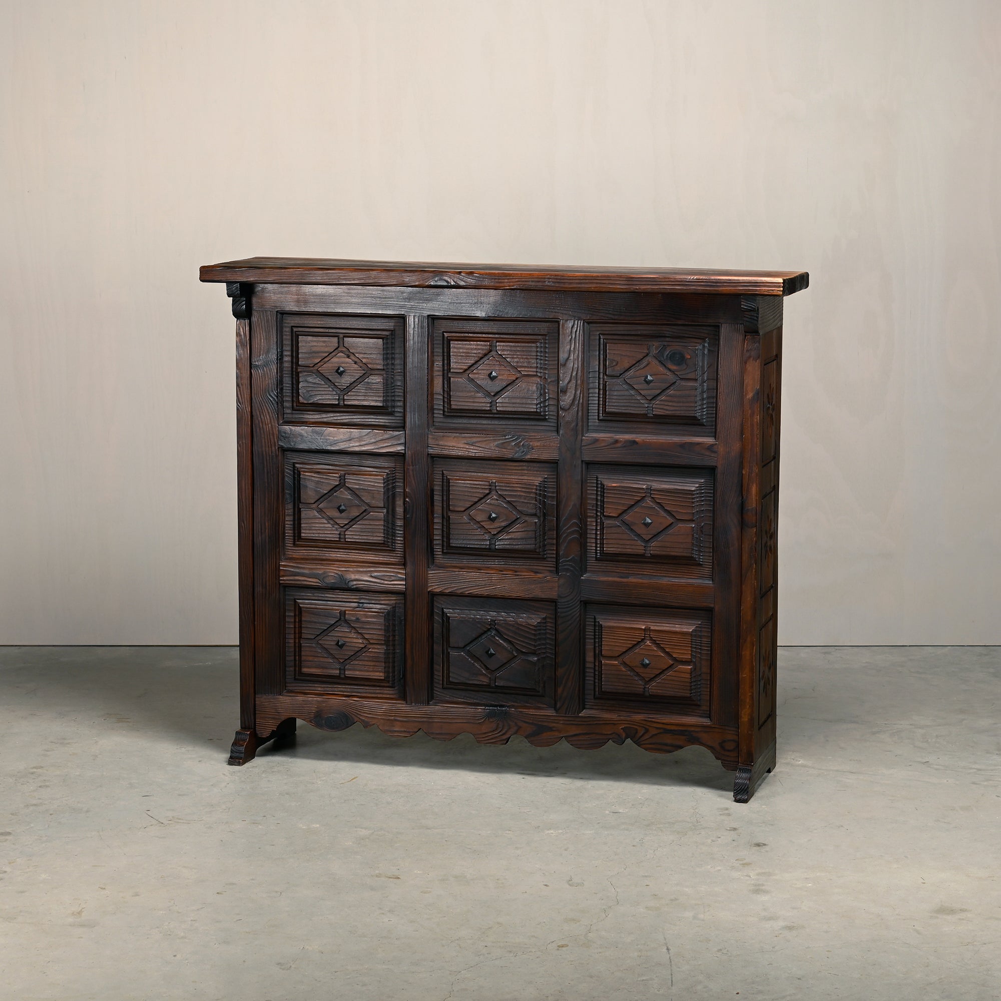 Set_of_Spanish_Brutalist_Folding_Home_Bar_with_3_Bar_Stools,_Carved_Dark_Wood,_1950s,_in_the_Style_of_Sergio_Rodrigues