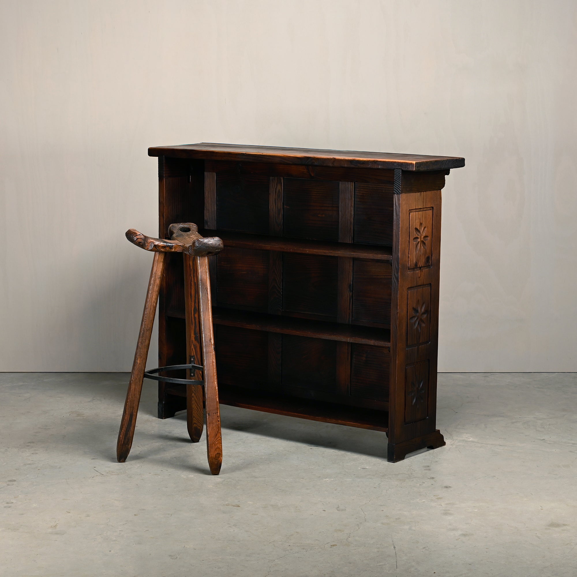 Set_of_Spanish_Brutalist_Folding_Home_Bar_with_3_Bar_Stools,_Carved_Dark_Wood,_1950s,_in_the_Style_of_Sergio_Rodrigues