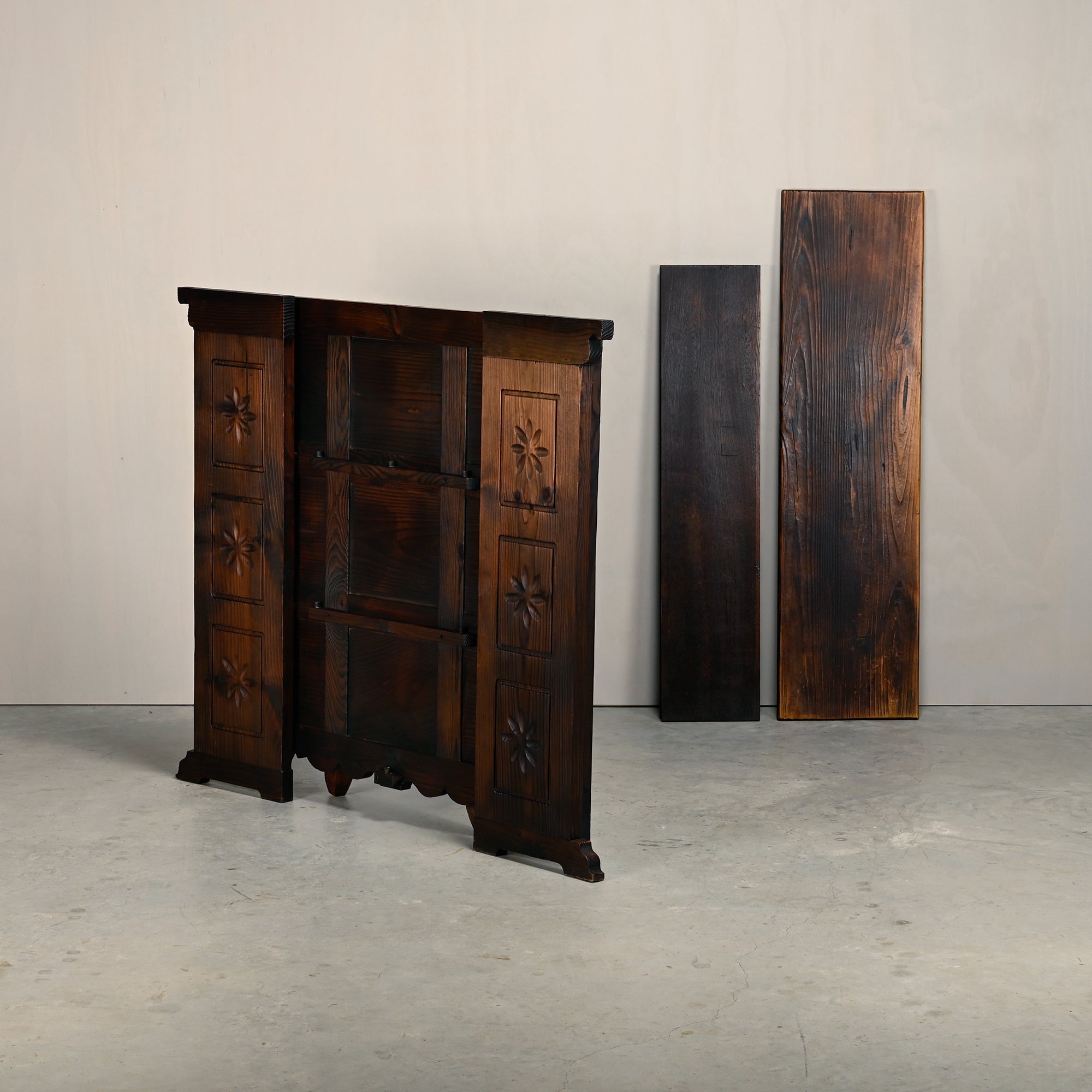 Set_of_Spanish_Brutalist_Folding_Home_Bar_with_3_Bar_Stools,_Carved_Dark_Wood,_1950s,_in_the_Style_of_Sergio_Rodrigues