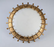 Sun_lamp_made_of_forged_nails_with_gold_leaf_and_opaline