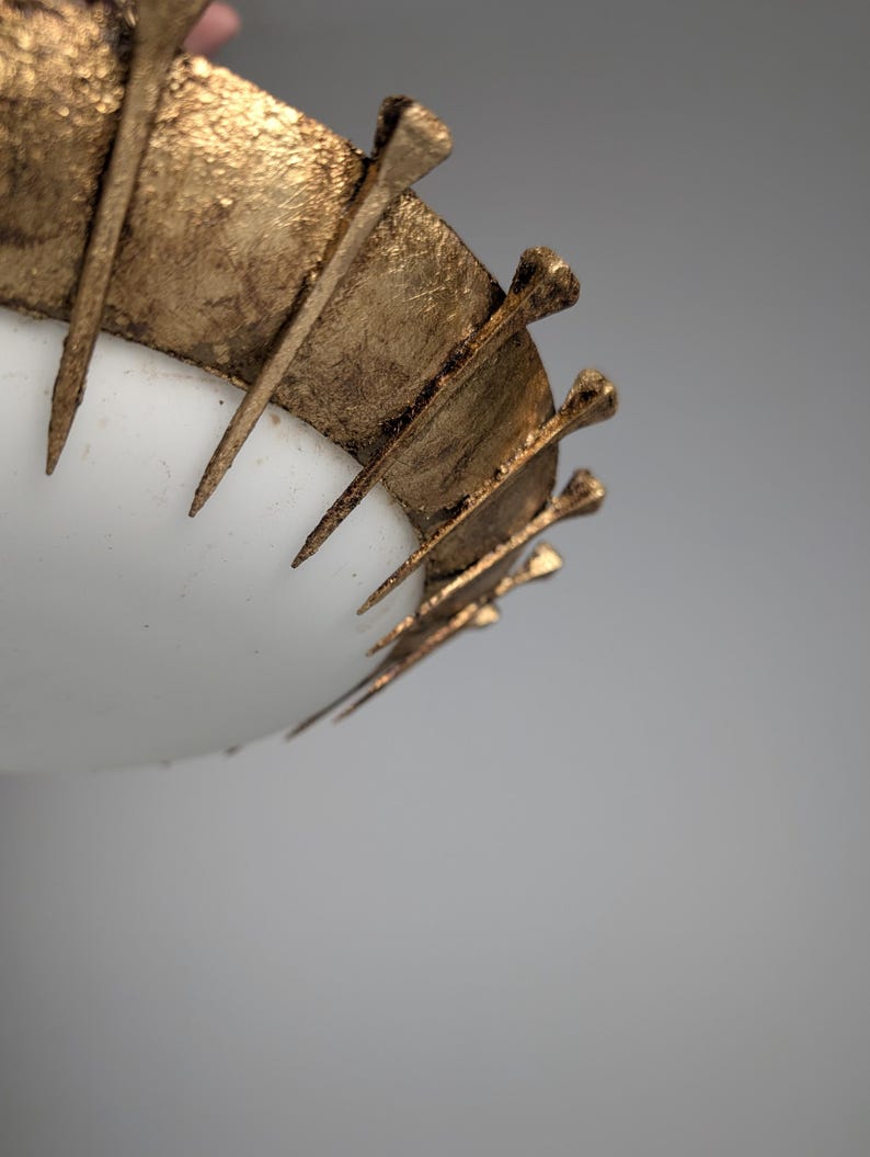 Sun_Pendant_lamp_made_of_forged_nails_with_gold_leaf_and_opaline