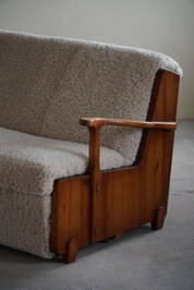 Swedish_Modern,_Freestanding_Two_Seater_Sofa_/_Bed_in_Pine_&_Lambswool,_1950s
