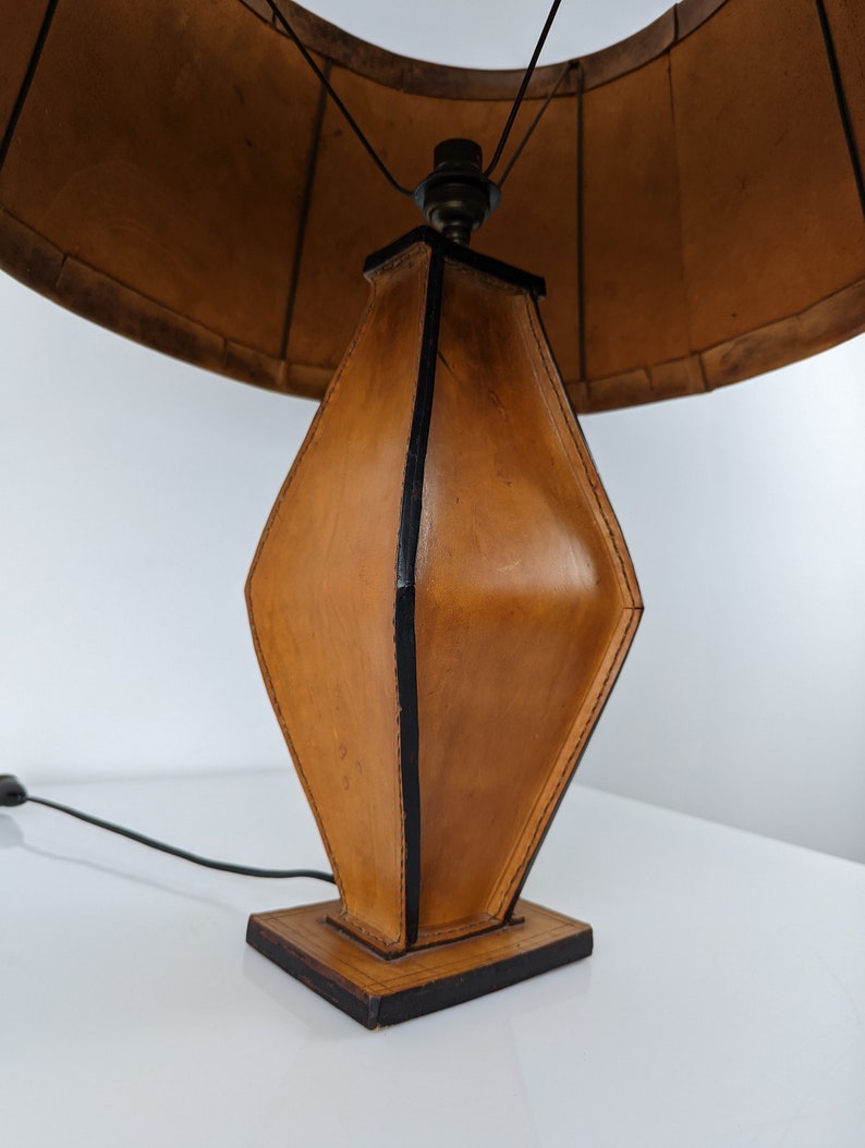 Table_lamp_in_leather_by_Jacques_Adnet_1940s