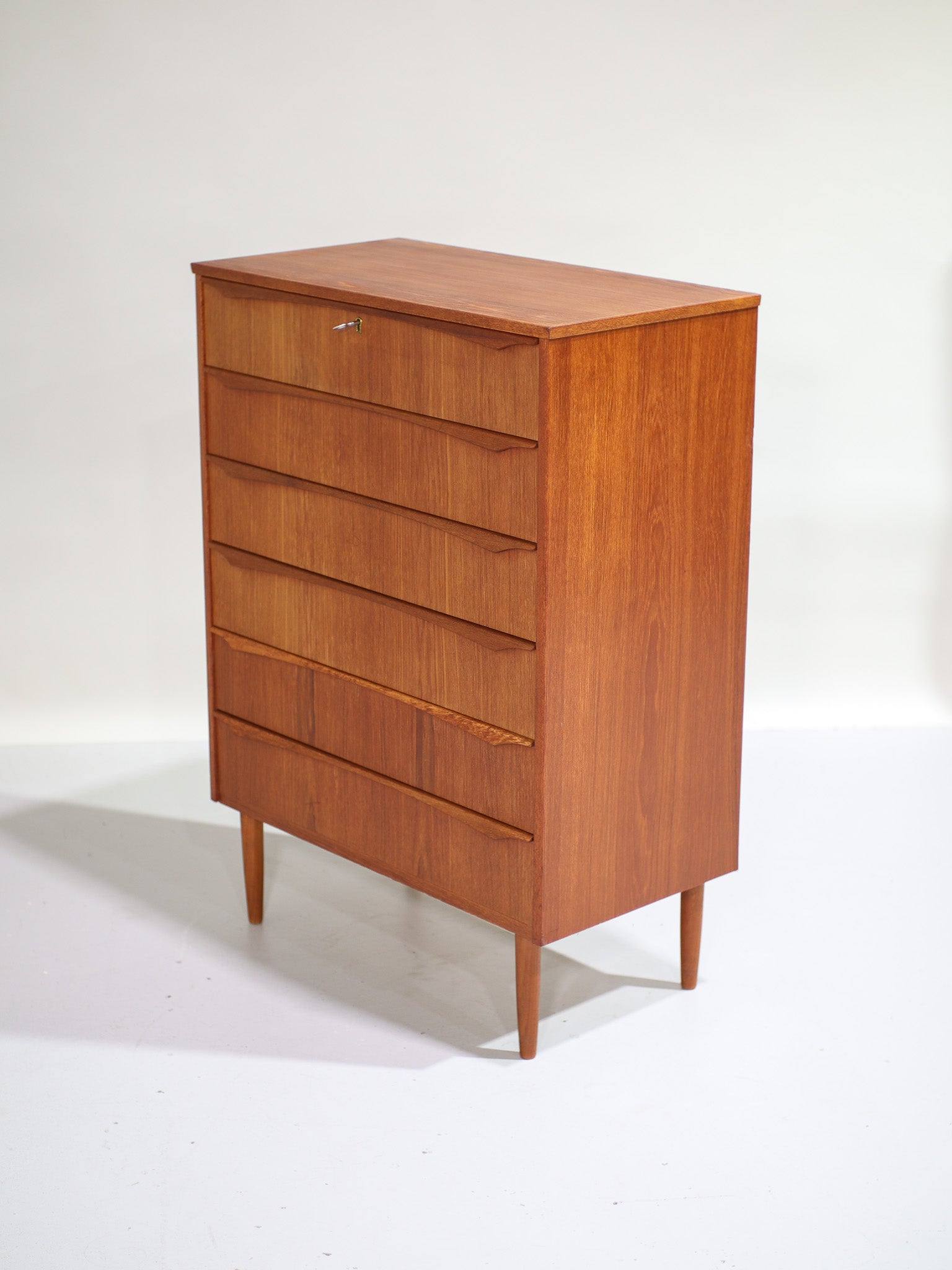 Tall_chest_of_drawers_teak_wood_vintage_Danish