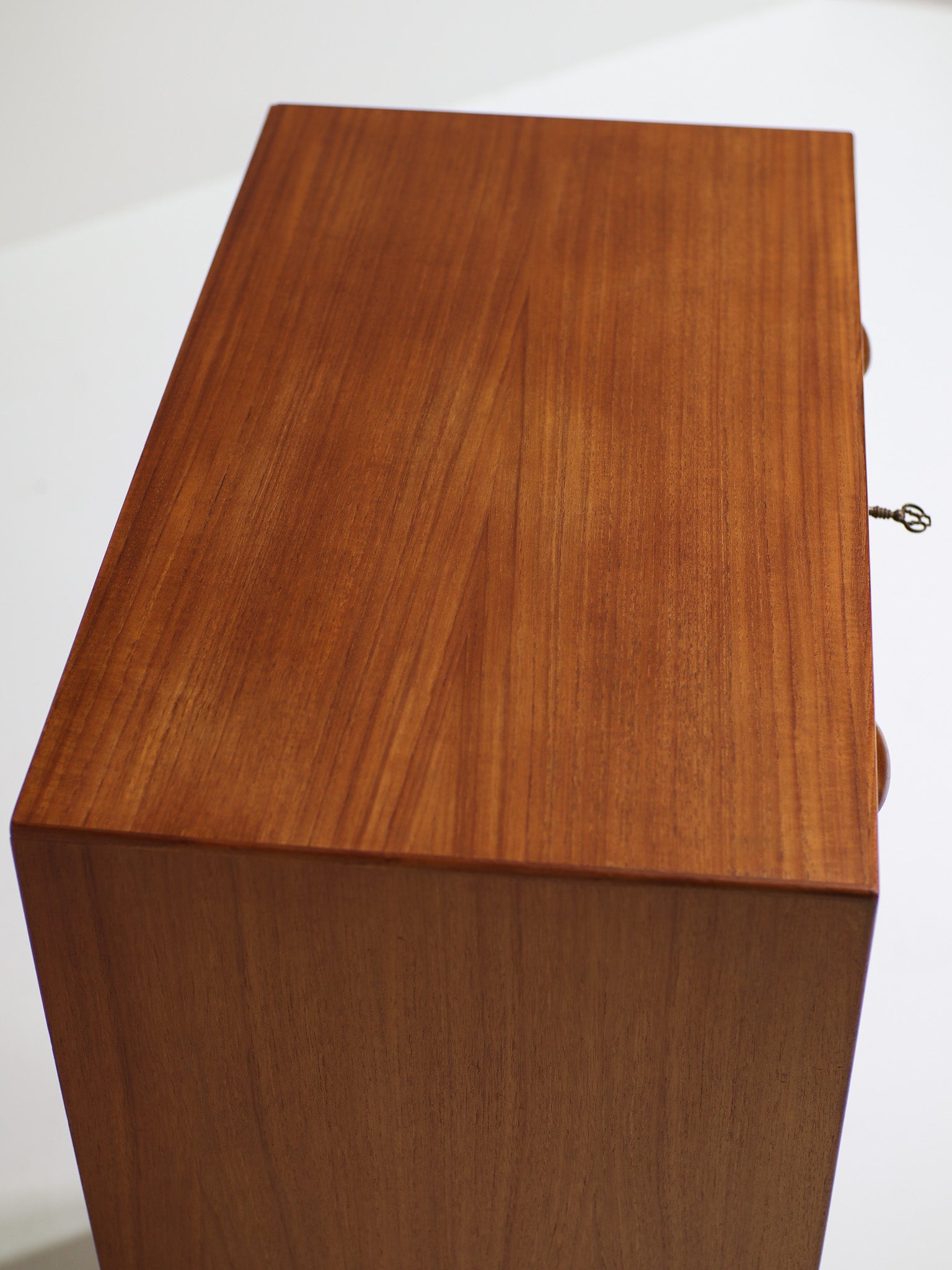 Tall_chest_of_drawers_with_shoe_rack_teak_Danish_1960s