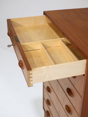 Tall_chest_of_drawers_with_shoe_rack_teak_Danish_1960s