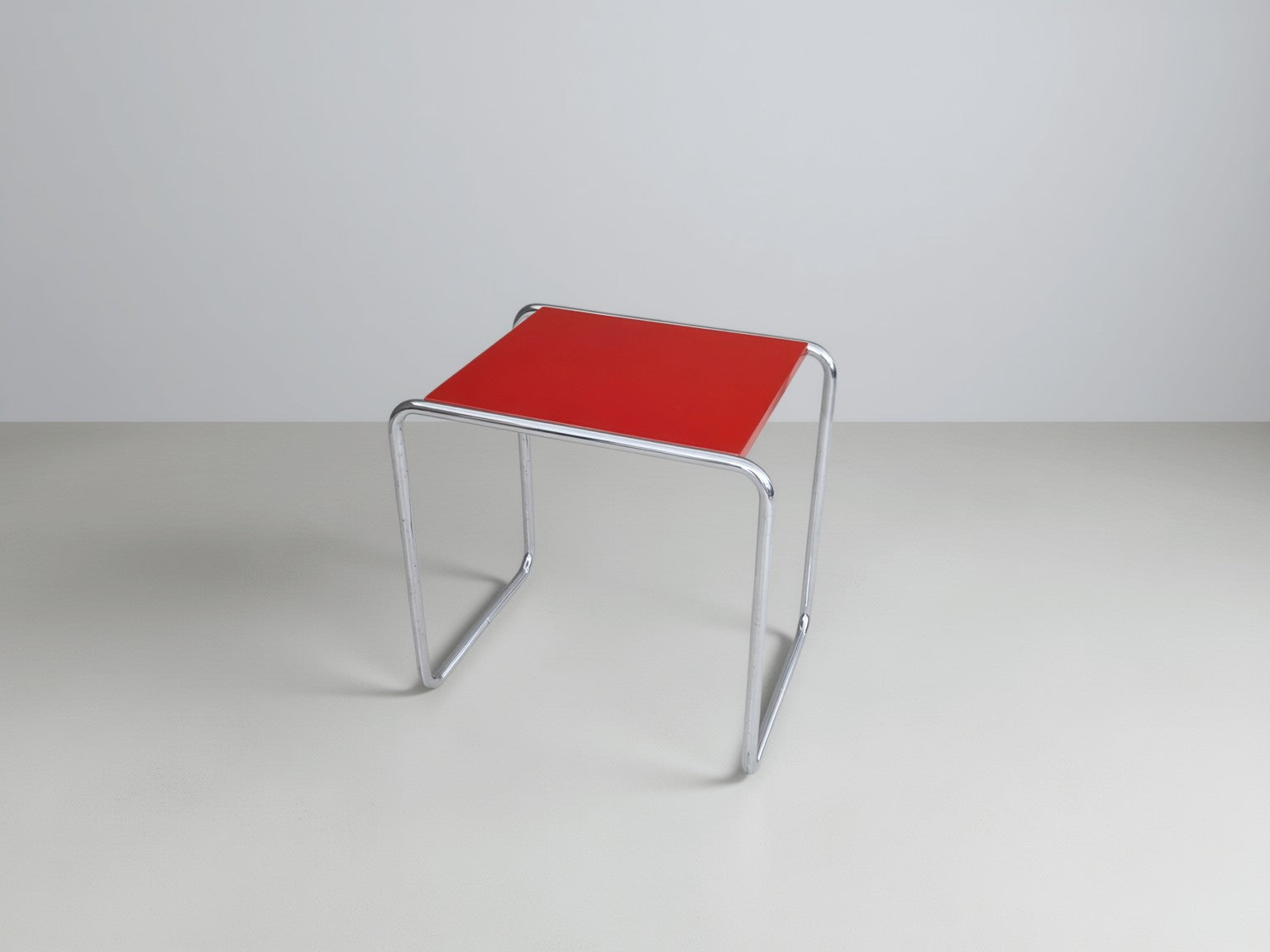 B9_Tubular_Steel_Side_Table_by_Marcel_Breuer_for_Thonet_with_Crimson_Red_Top,_1930s