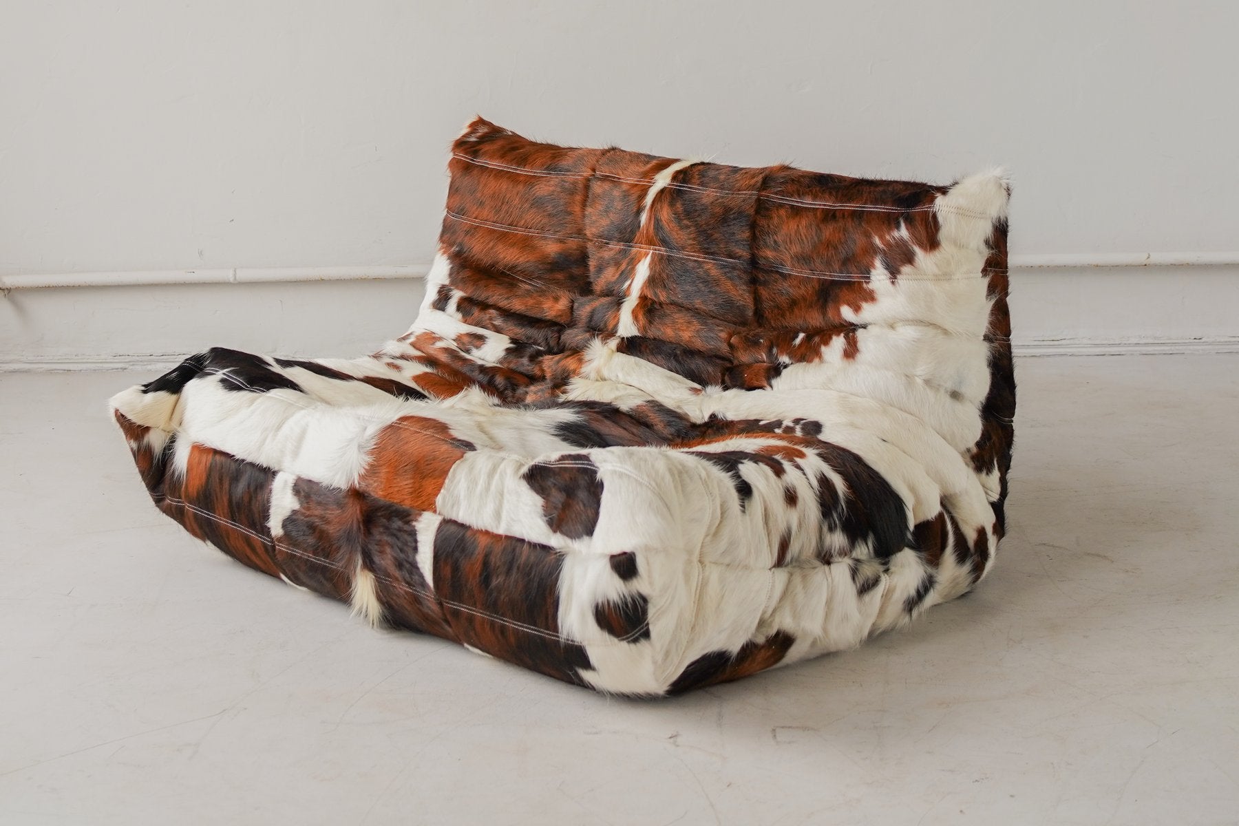 Togo_Two-Seater_Sofa_by_Michel_Ducaroy_for_Ligne_Roset,_Cow_Leather,_France
