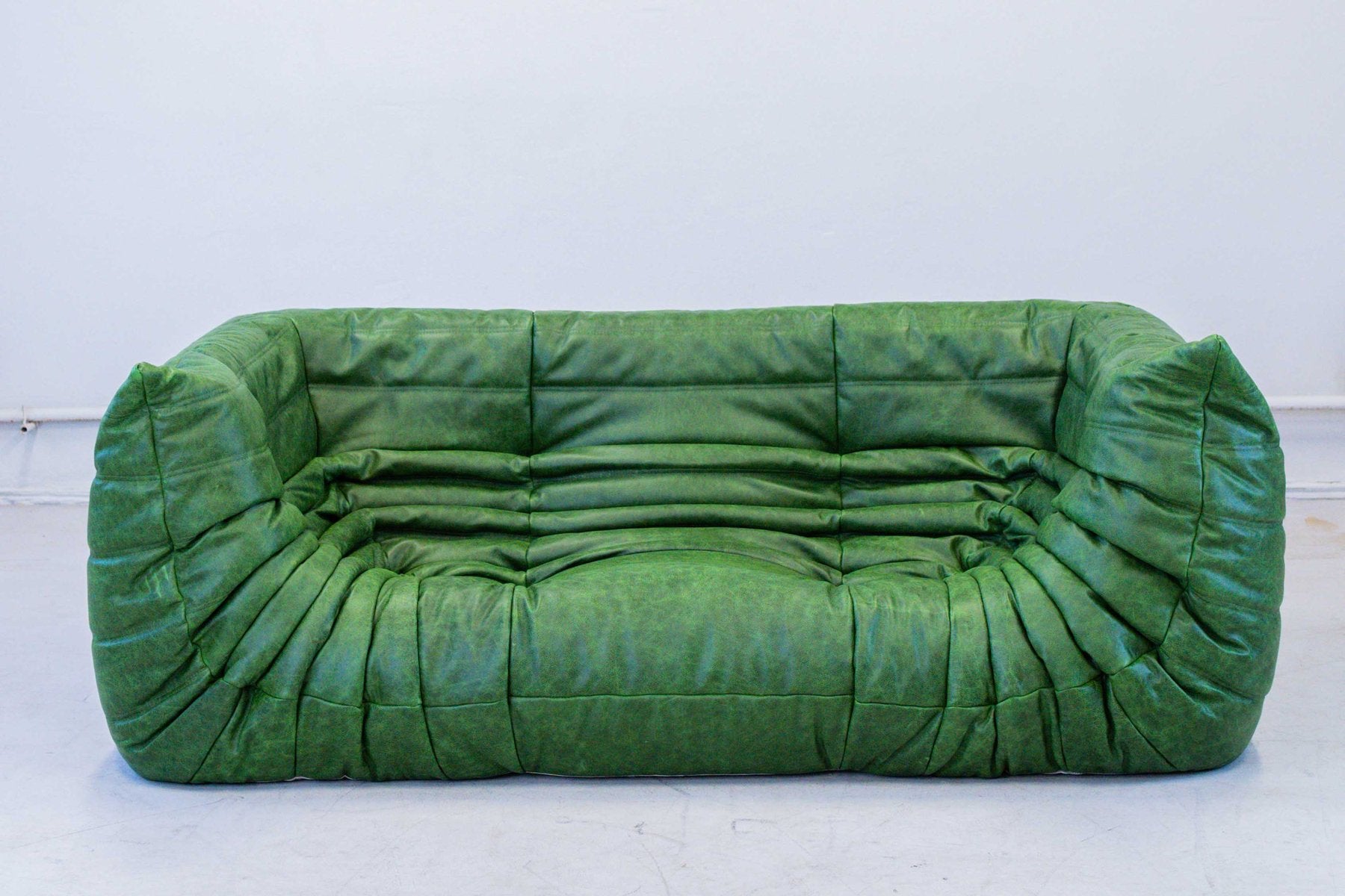 Togo_Two-Seater_Sofa_with_Arms_in_Green_Leather_by_Michel_Ducaroy_for_Ligne_Roset,_France,_1970s