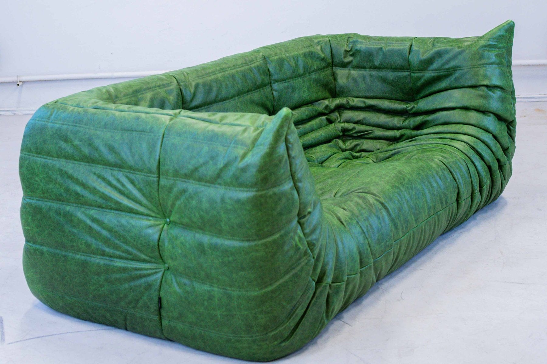 Togo_Two-Seater_Sofa_with_Arms_in_Green_Leather_by_Michel_Ducaroy_for_Ligne_Roset,_France,_1970s