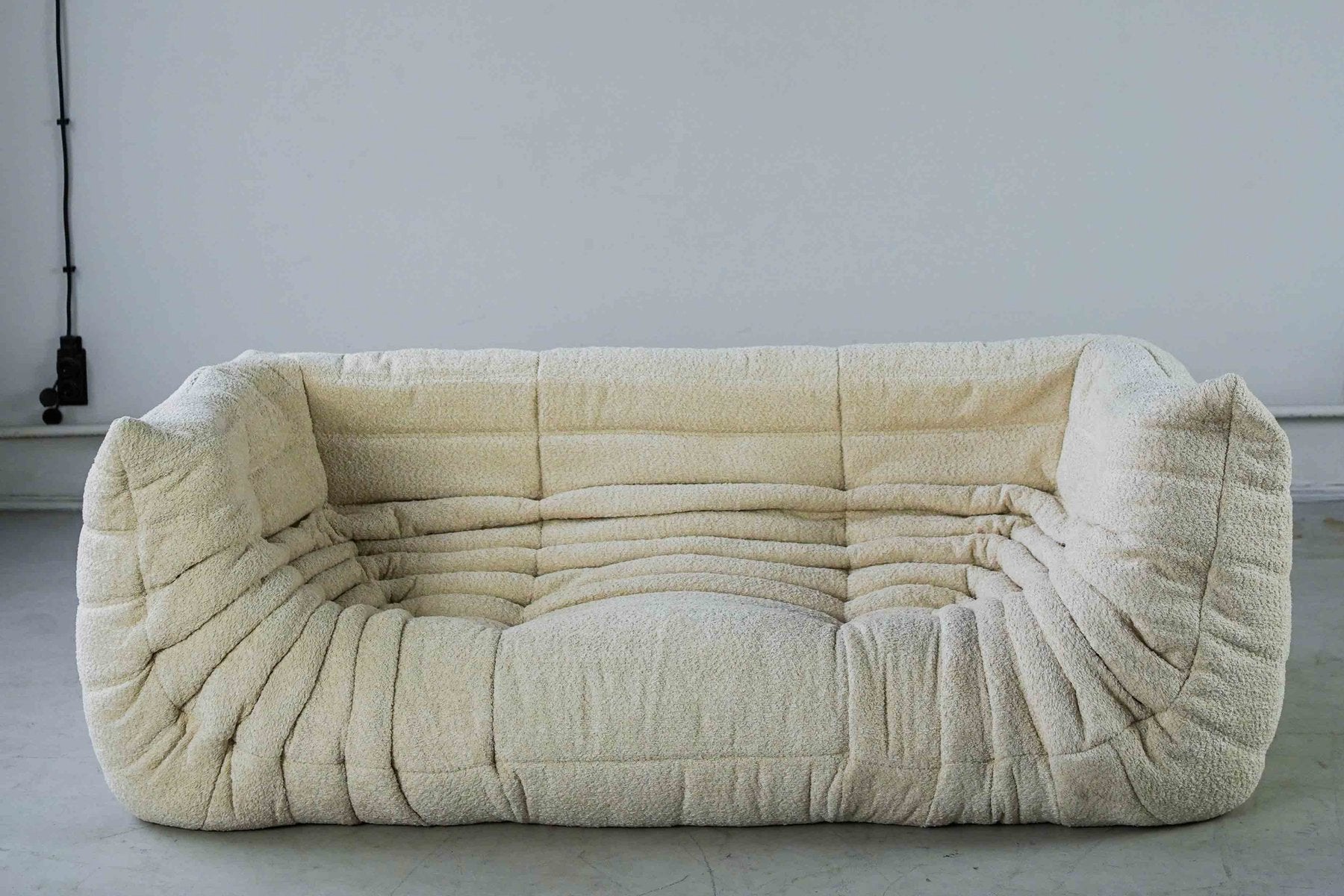 Togo_Two-Seater_Sofa_with_Arms_in_White_Bouclette_by_Michel_Ducaroy_for_Ligne_Roset,_France,_1970s