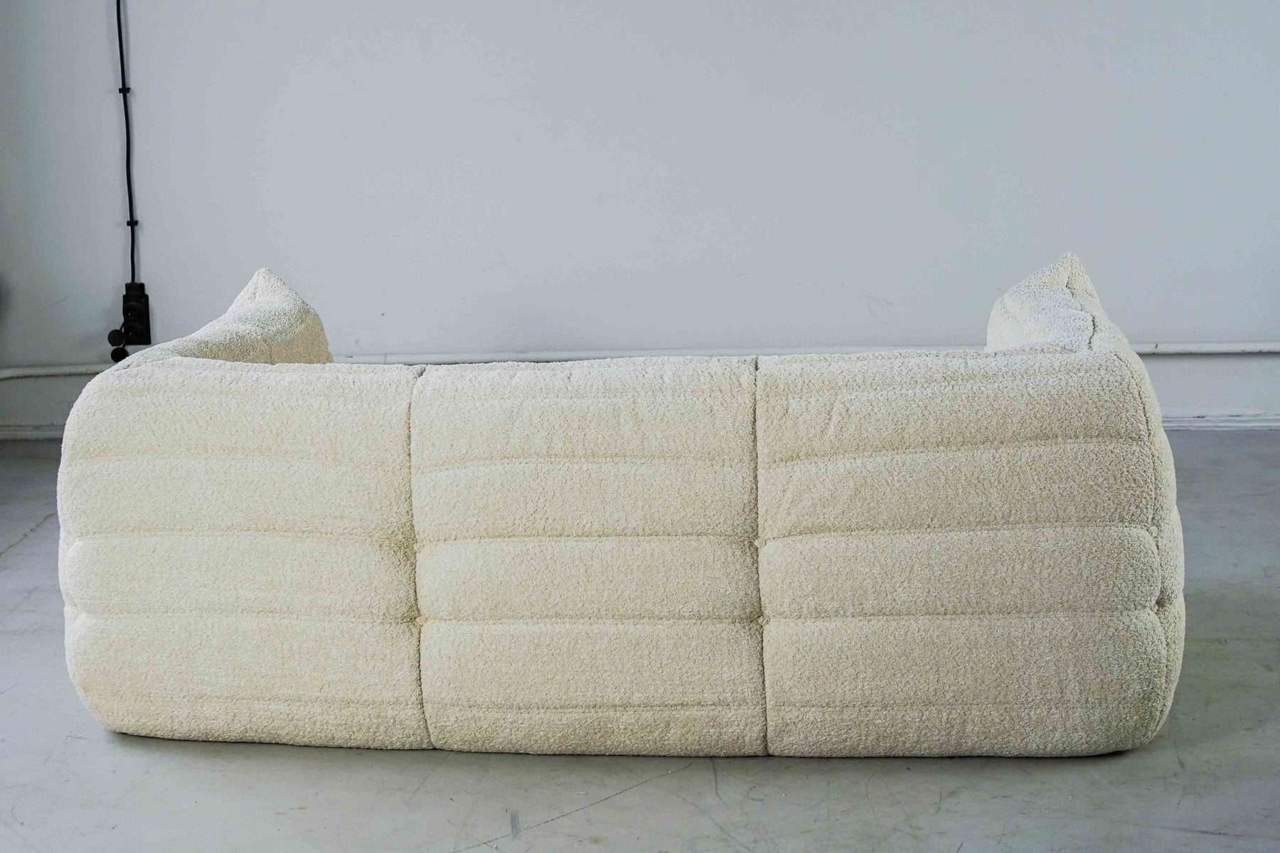 Togo_Two-Seater_Sofa_with_Arms_in_White_Bouclette_by_Michel_Ducaroy_for_Ligne_Roset,_France,_1970s