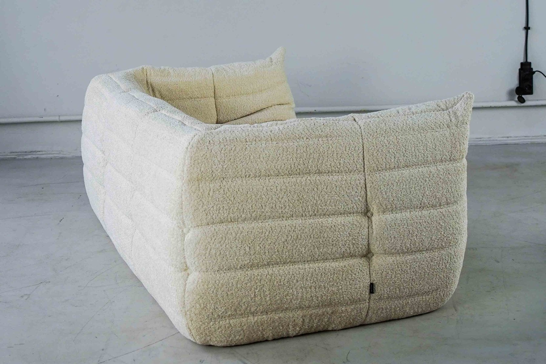 Togo_Two-Seater_Sofa_with_Arms_in_White_Bouclette_by_Michel_Ducaroy_for_Ligne_Roset,_France,_1970s