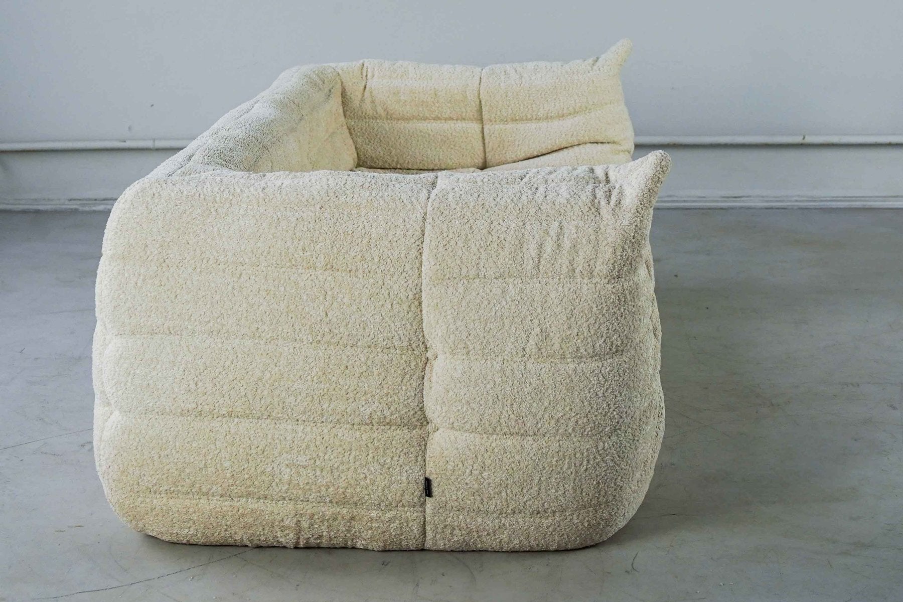 Togo_Two-Seater_Sofa_with_Arms_in_White_Bouclette_by_Michel_Ducaroy_for_Ligne_Roset,_France,_1970s