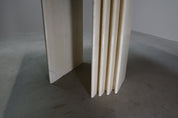 Travertine_dining_table_with_sculptural_base,_Italy_1960s