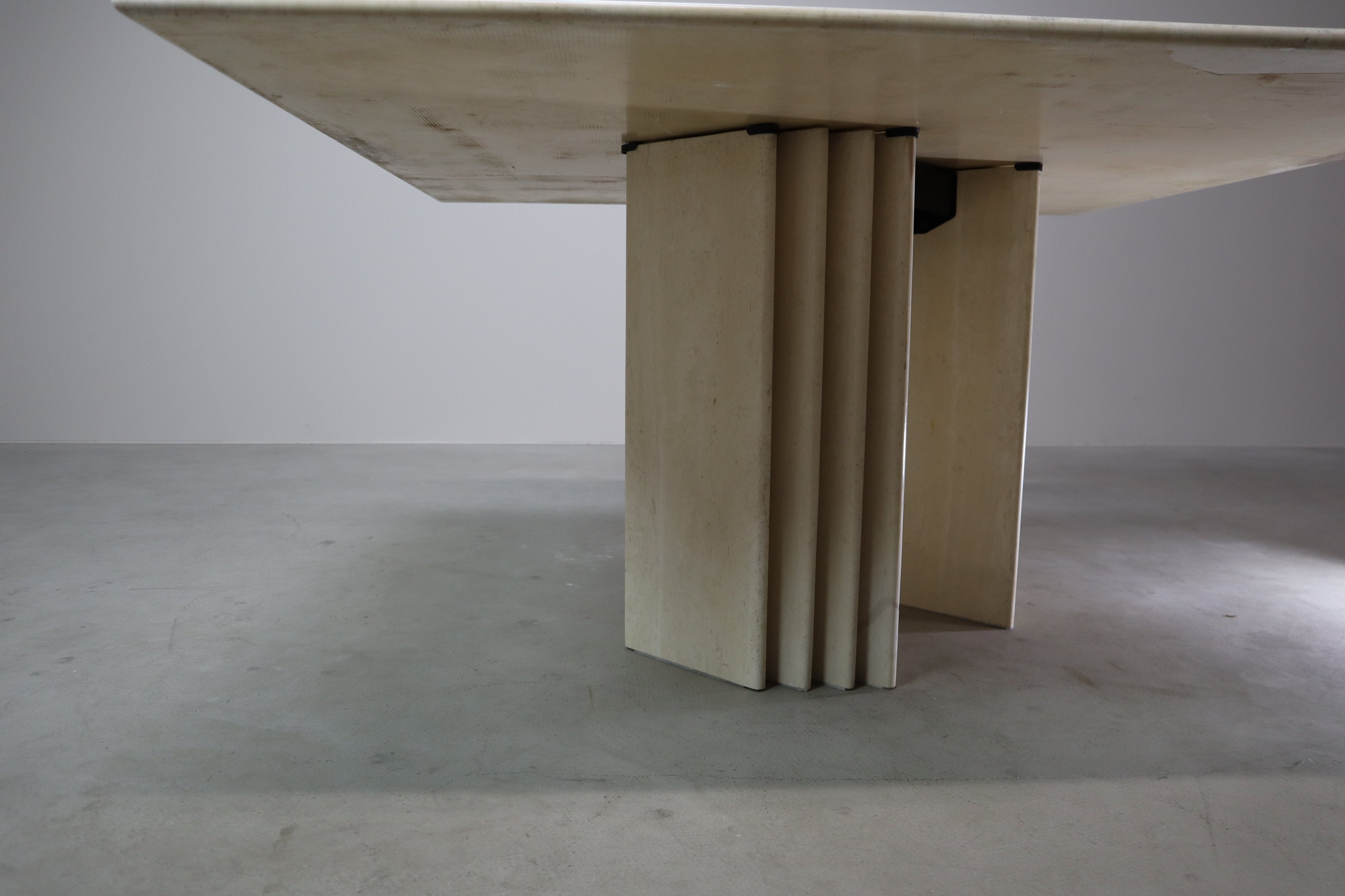 Travertine_dining_table_with_sculptural_base,_Italy_1960s