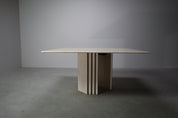 Travertine_dining_table_with_sculptural_base,_Italy_1960s
