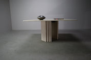 Travertine_dining_table_with_sculptural_base,_Italy_1960s