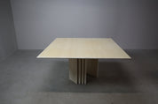 Travertine_dining_table_with_sculptural_base,_Italy_1960s