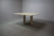 Travertine_dining_table_with_sculptural_base,_Italy_1960s
