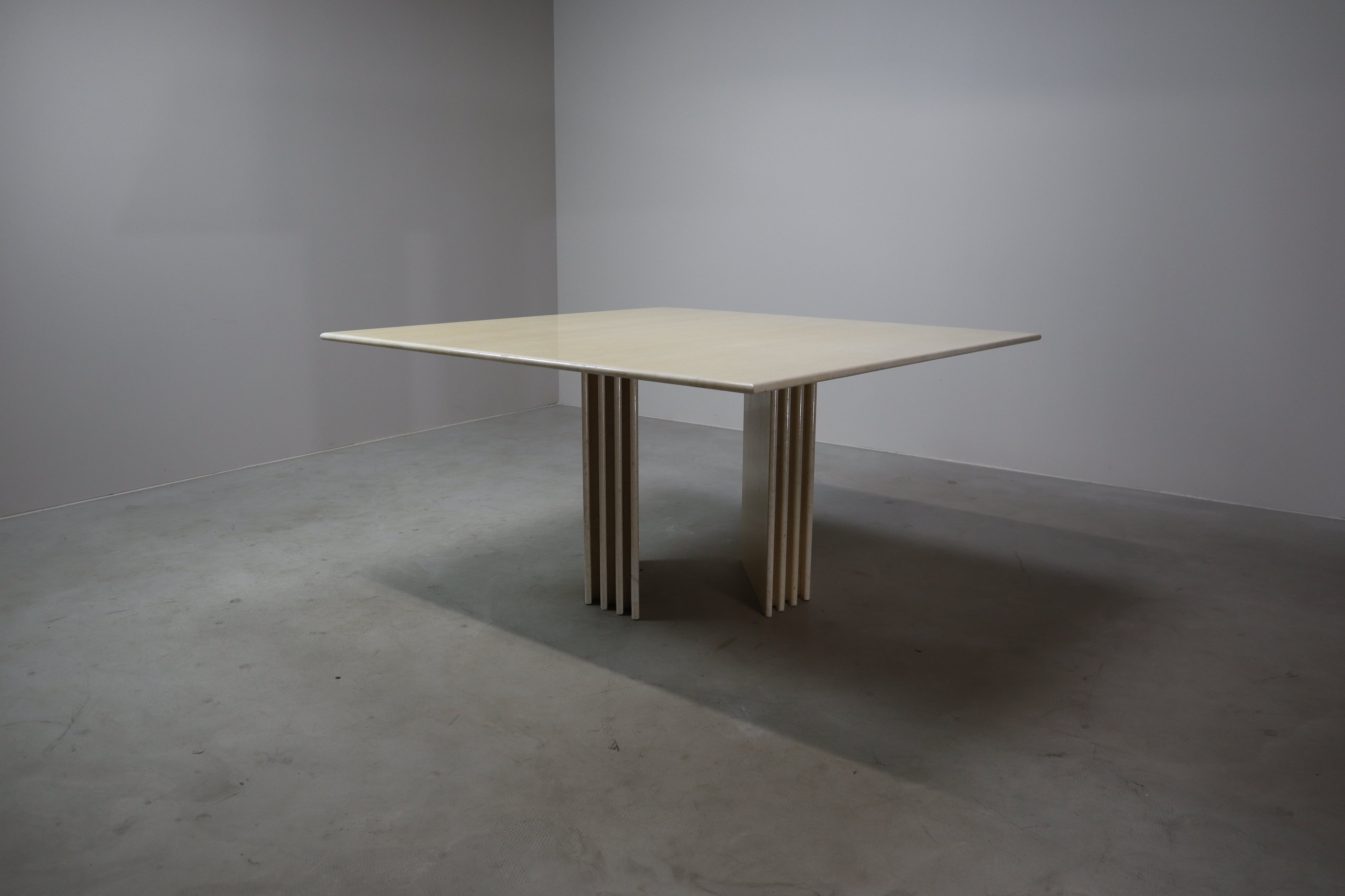 Travertine_dining_table_with_sculptural_base,_Italy_1960s
