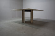 Travertine_dining_table_with_sculptural_base,_Italy_1960s