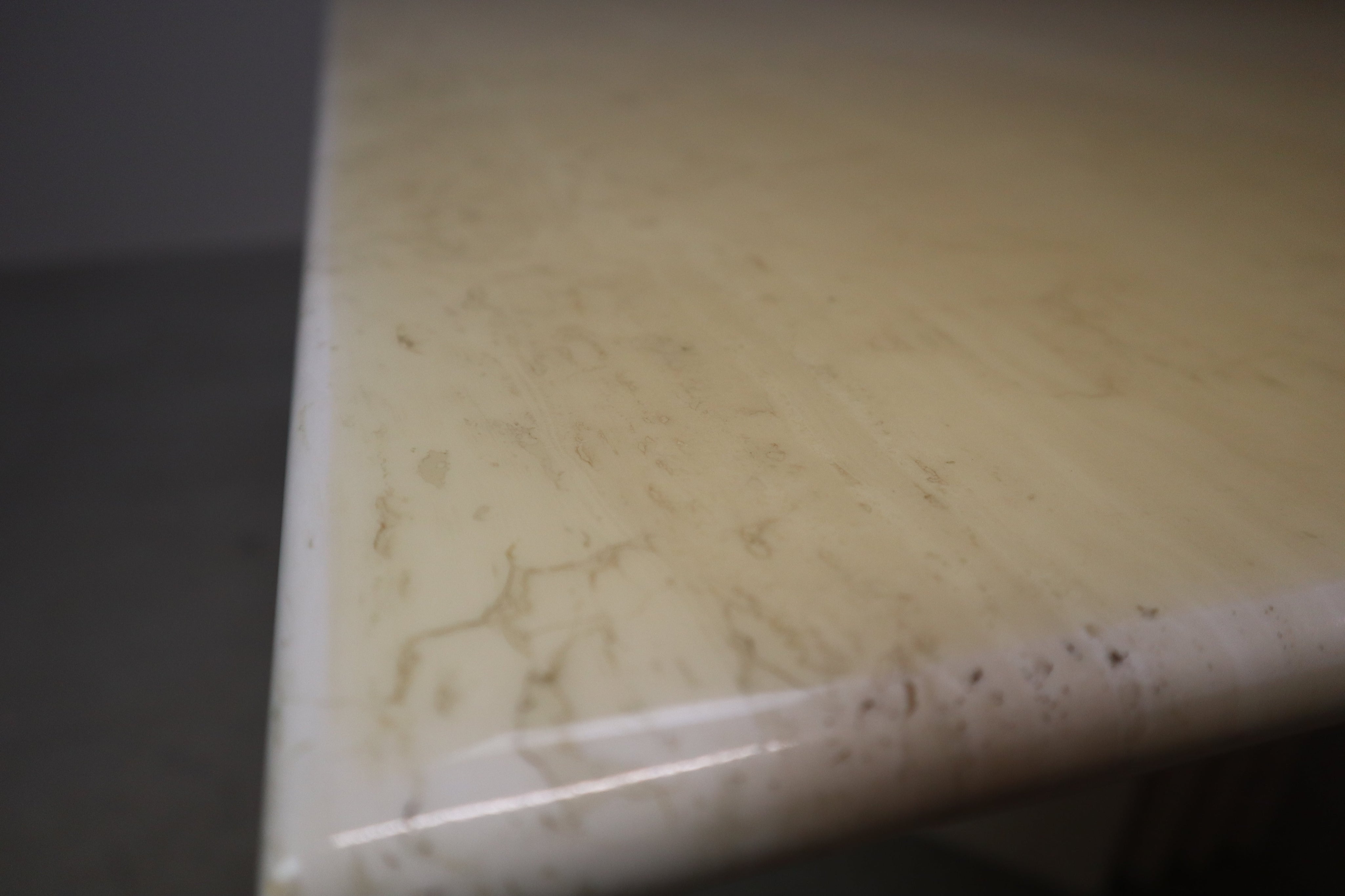 Travertine_dining_table_with_sculptural_base,_Italy_1960s