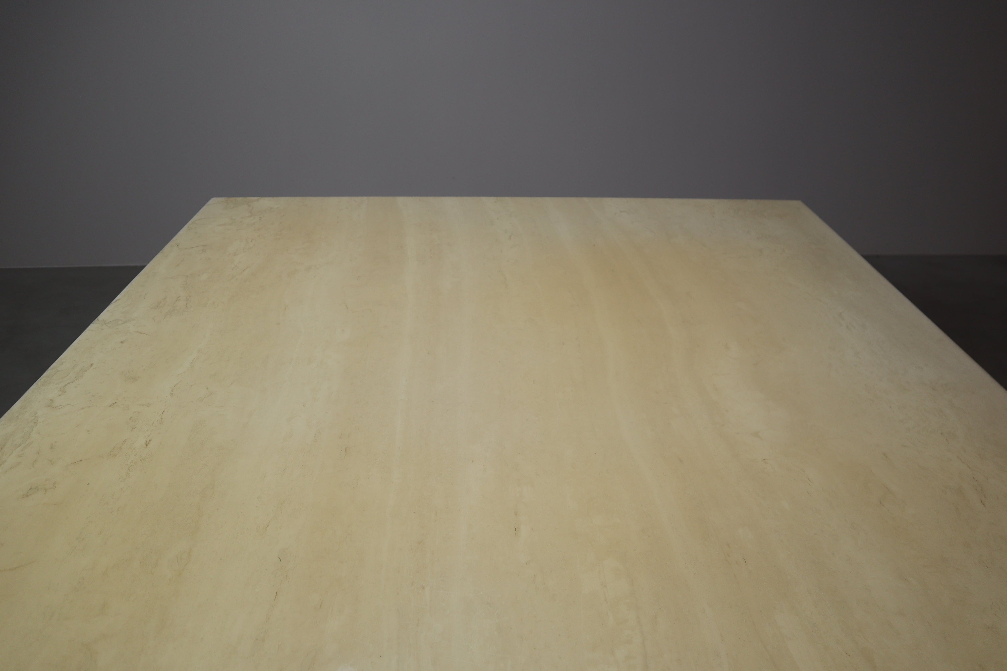Travertine_dining_table_with_sculptural_base,_Italy_1960s