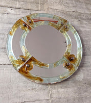 Venetian_round_mirror_in_amber_murano_glass_by_Mazzega_from_1960s
