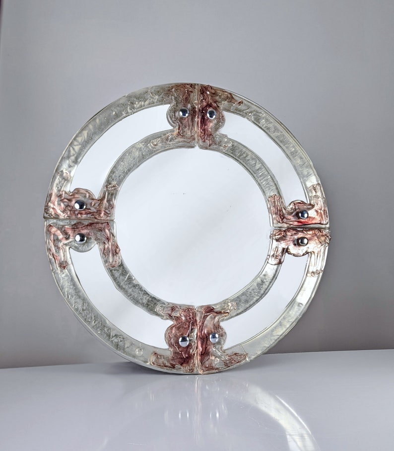 Venetian_round_mirror_in_pink_and_purple_murano_glass_by_Mazzega_1960s