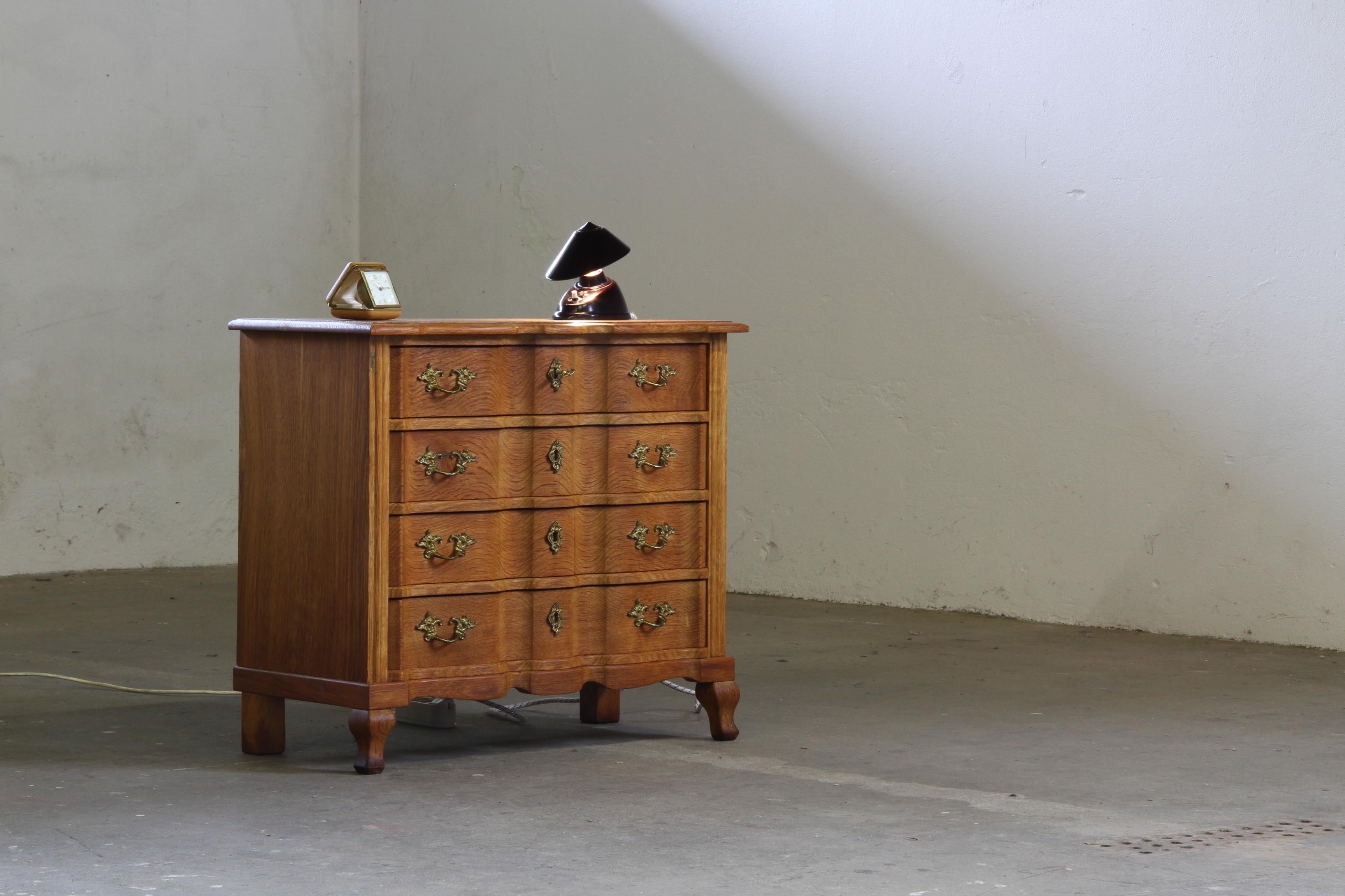Danish_Sculptural_Oak_Bedside_Cabinet_in_the_Style_of_Henning_Kjærnulf