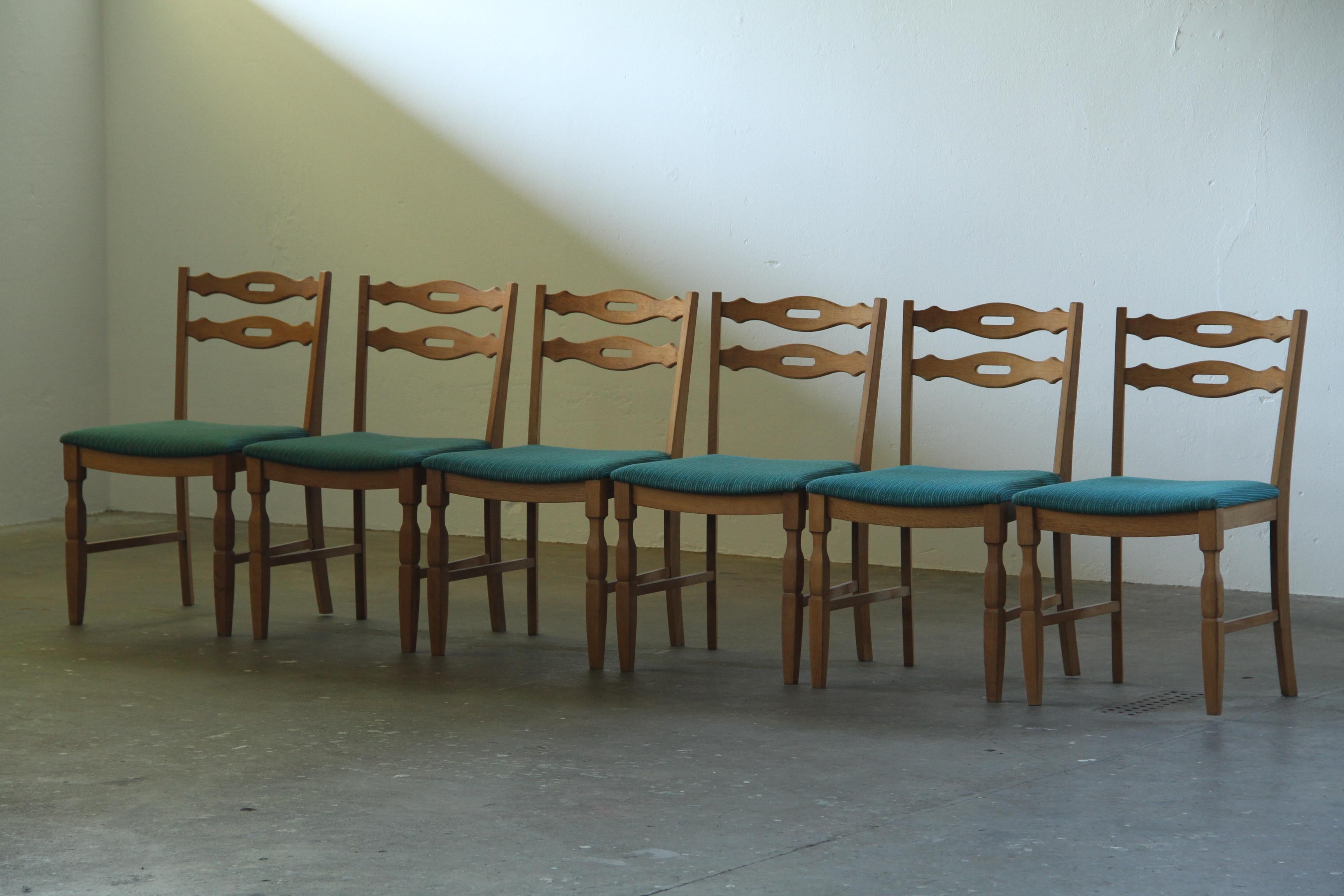 Set_of_6_Danish_Brutalist_Oak_Dining_Chairs_with_Green_Upholstery_in_the_Style_of_Henning_Kjærnulf,_1960s