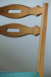 Set_of_6_Danish_Brutalist_Oak_Dining_Chairs_with_Green_Upholstery_in_the_Style_of_Henning_Kjærnulf,_1960s