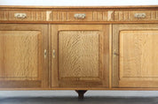 Danish_Brutalist_Solid_Oak_Low_Sideboard_with_Carved_Geometric_Doors,_Attributed_to_Henning_Kjærnulf