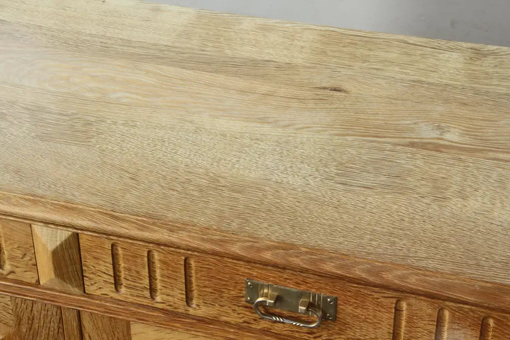Danish_Brutalist_Solid_Oak_Low_Sideboard_with_Carved_Geometric_Doors,_Attributed_to_Henning_Kjærnulf
