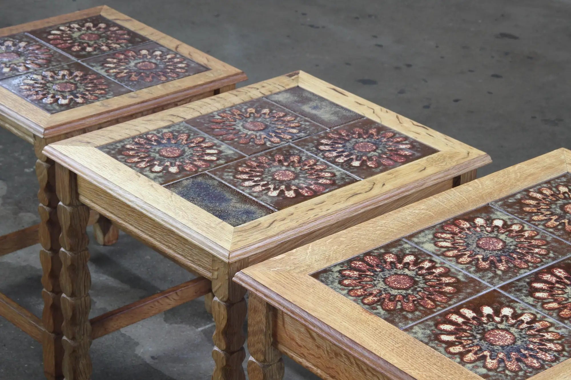 Set_of_3_Danish_Brutalist_Oak_Nesting_Tables_with_Floral_Ceramic_Tiles,_Attributed_to_Henning_Kjærnulf,_1960s