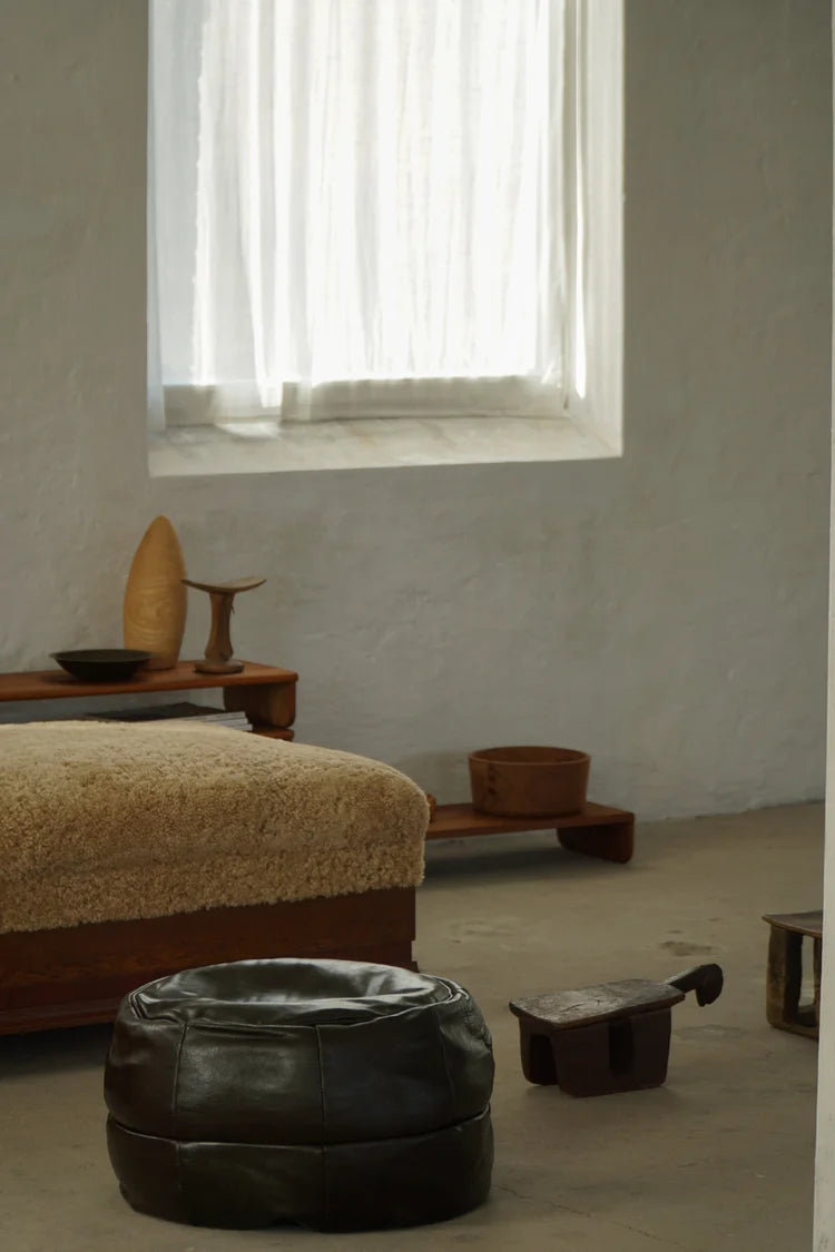 Vintage_Black_Leather_Pouf_Ottoman