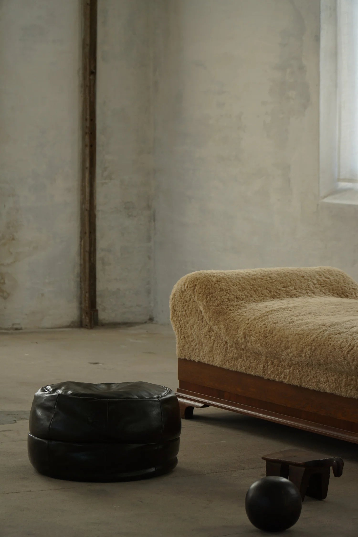 Vintage_Black_Leather_Pouf_Ottoman