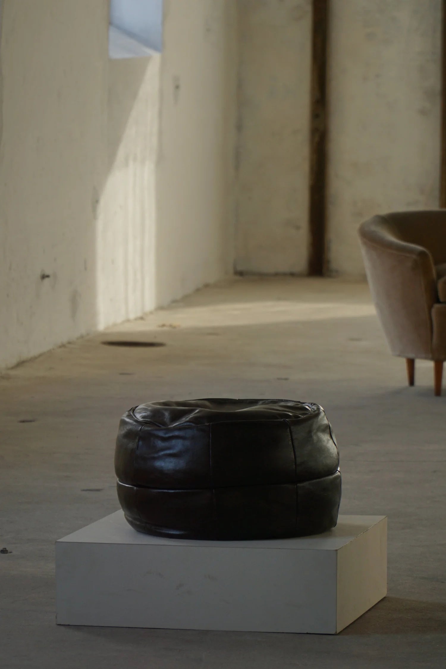 Vintage_Black_Leather_Pouf_Ottoman