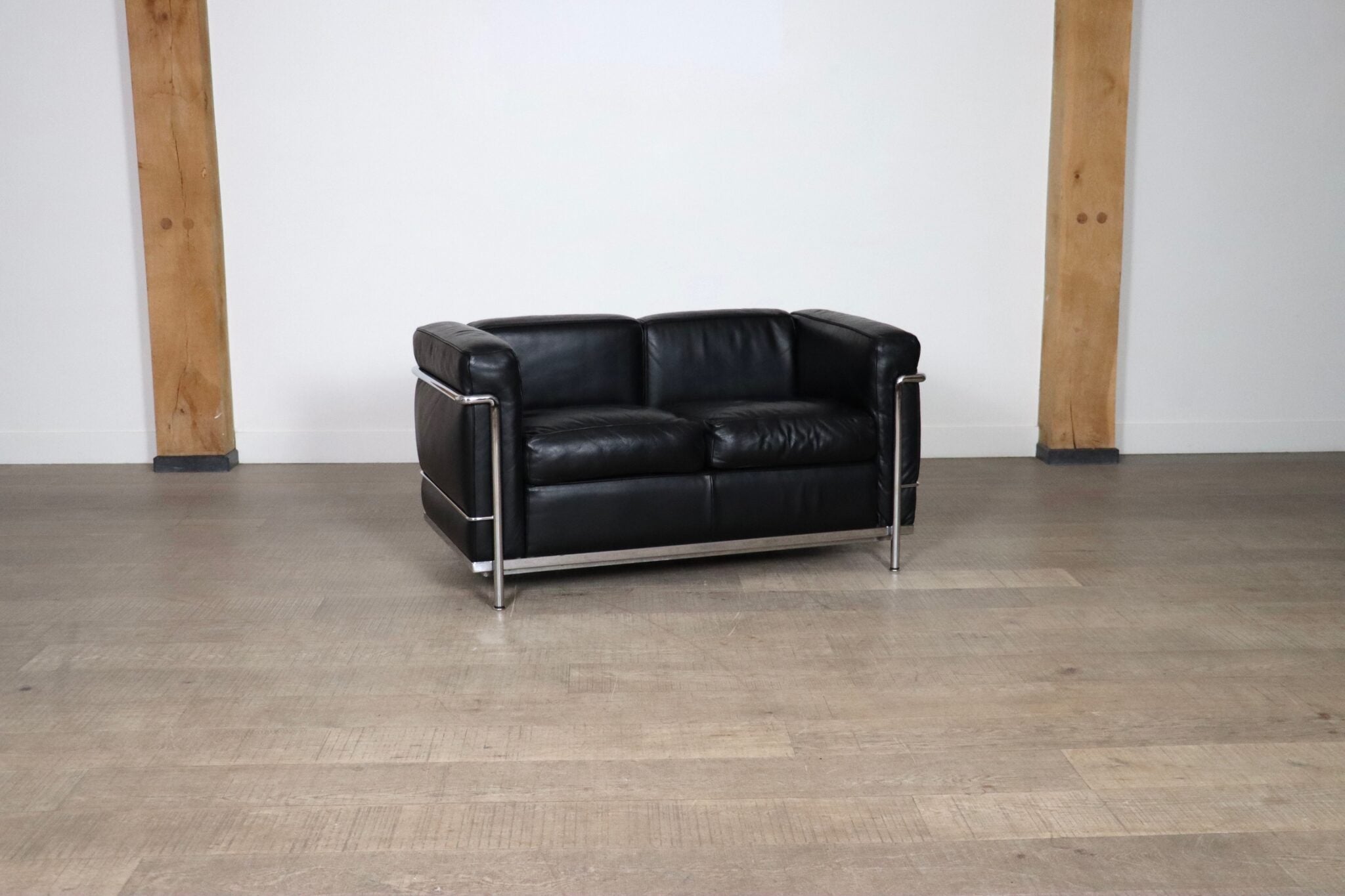 Vintage_Cassina_LC2_two_seater_sofa_By_Charlotte_Perriand_And_Le_Corbusier