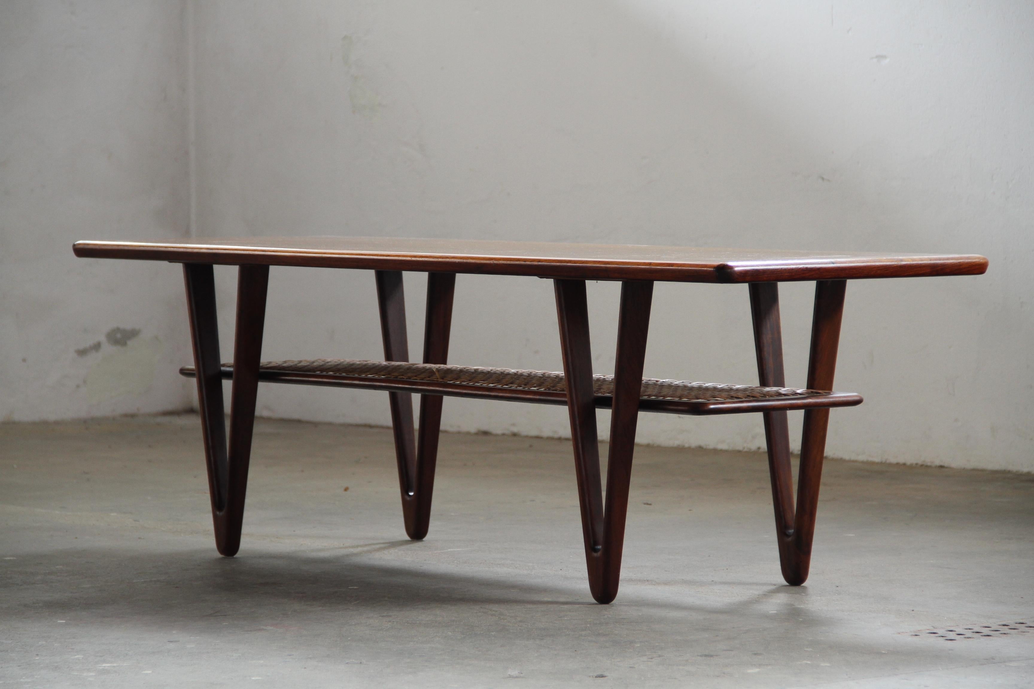Danish_Mid-Century_Modern_Solid_Teak_Coffee_Table_with_Cane_Shelf_by_Kurt_Østervig,_1950s