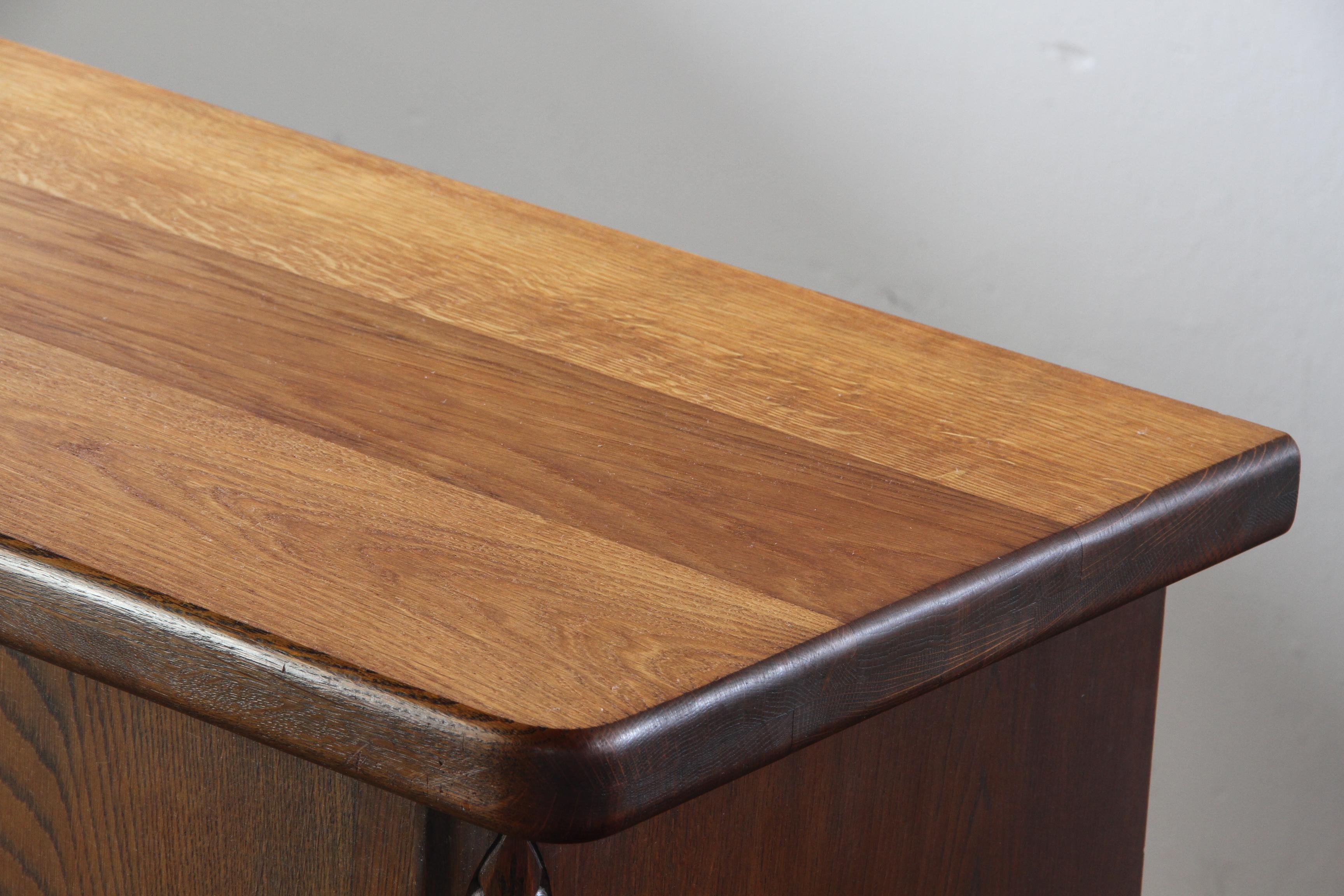 Danish_Brutalist_Oak_Cabinet_with_Carved_Diamond_Details,_Attributed_to_Henning_Kjærnulf,_1960s